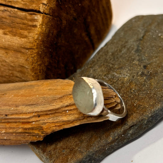 Silver ring with aqua Cornish sea glass in a bezel setting