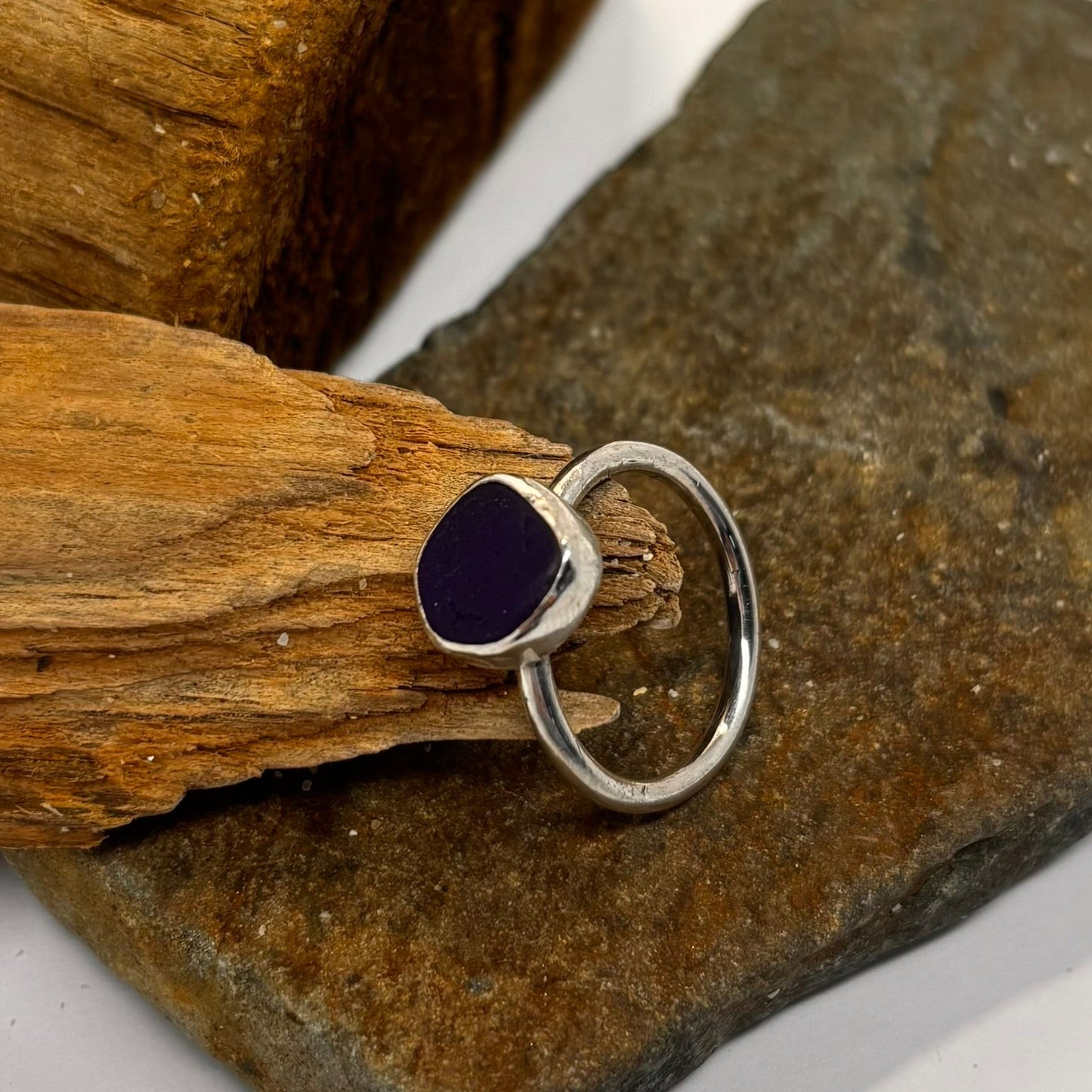Silver ring with a blue sea glass ina bezel setting